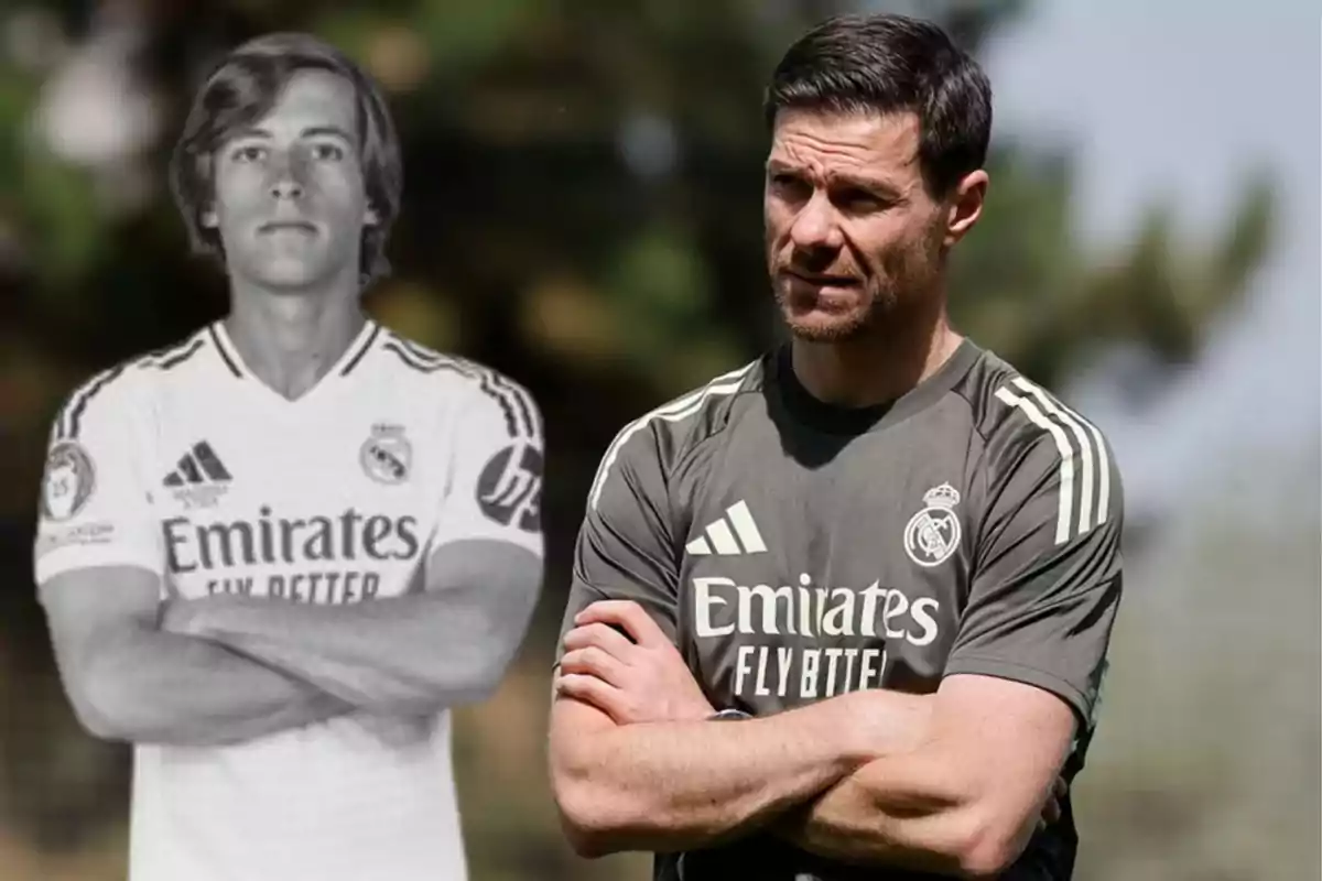 Dos hombres con uniforme del Real Madrid uno en blanco y negro con los brazos cruzados y otro en color con camiseta de entrenamiento y los brazos también cruzados