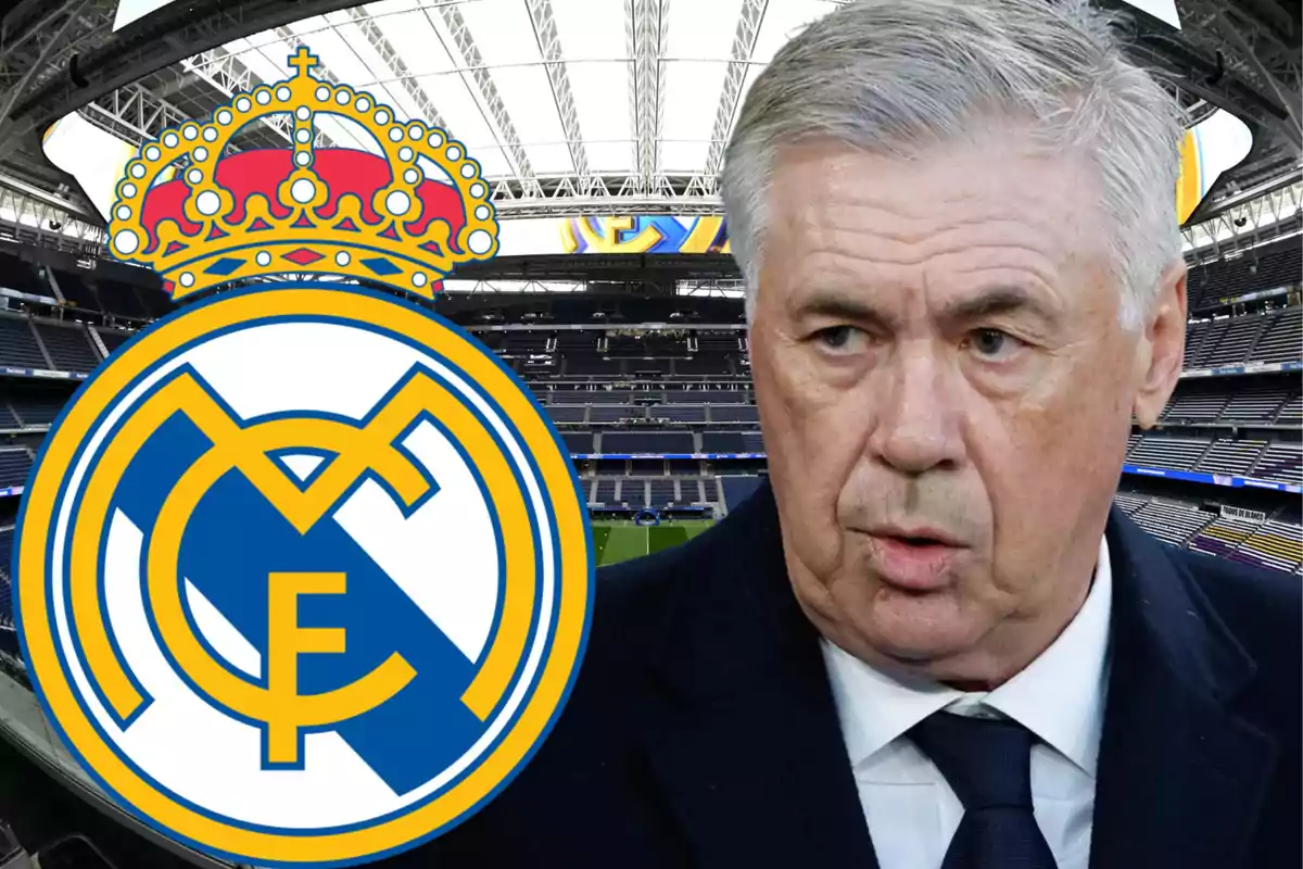 Un hombre de cabello canoso en un estadio con el logo del Real Madrid en primer plano.
