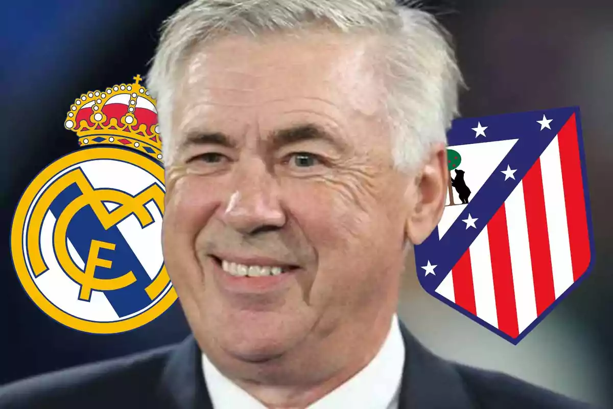 Un hombre sonriente con los escudos del Real Madrid y Atlético de Madrid al fondo.