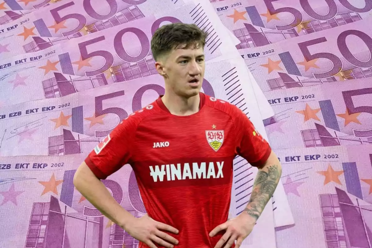 Soccer player wearing a red Stuttgart jersey posing in front of a background of 500-euro bills