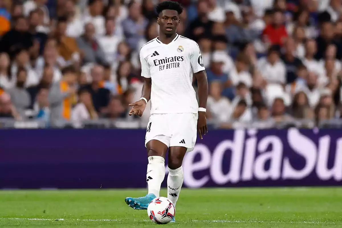 Real Madrid soccer player on the field during a match. Real Madrid soccer player on the field during a match.