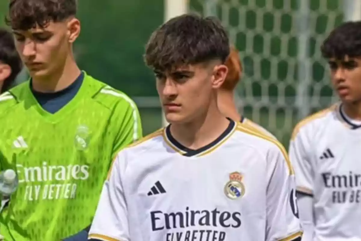 Young footballers in Real Madrid uniforms at a training camp. Young footballers in Real Madrid uniforms at a training camp.