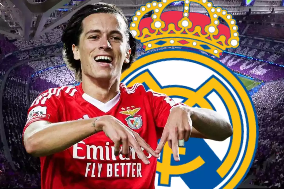 Soccer player in a red Benfica uniform celebrating in front of the Real Madrid crest in a stadium full of fans