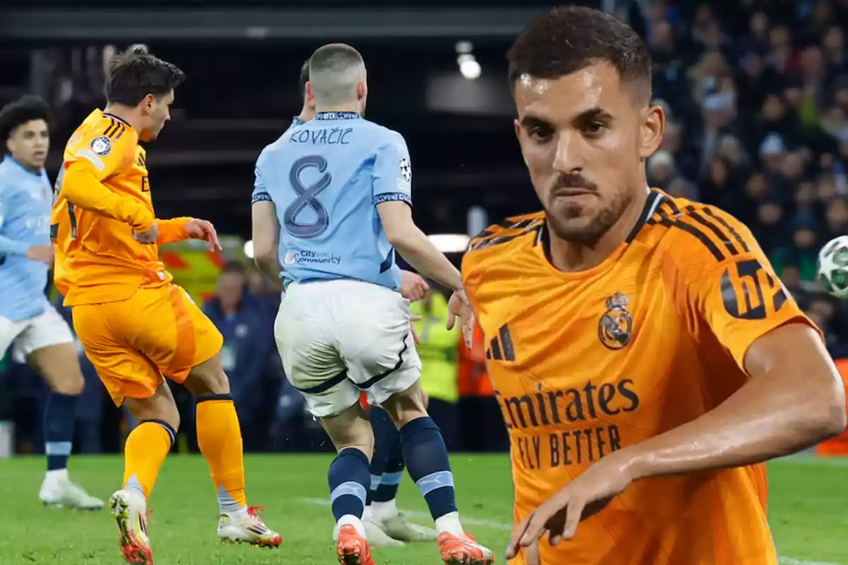 Jugadores de fútbol en acción durante un partido, uno con uniforme naranja y otro con uniforme azul.