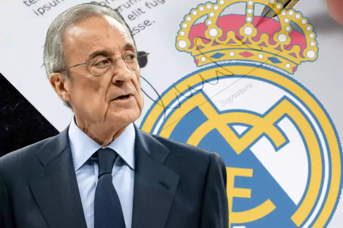 A man in a suit in front of a soccer team's crest.