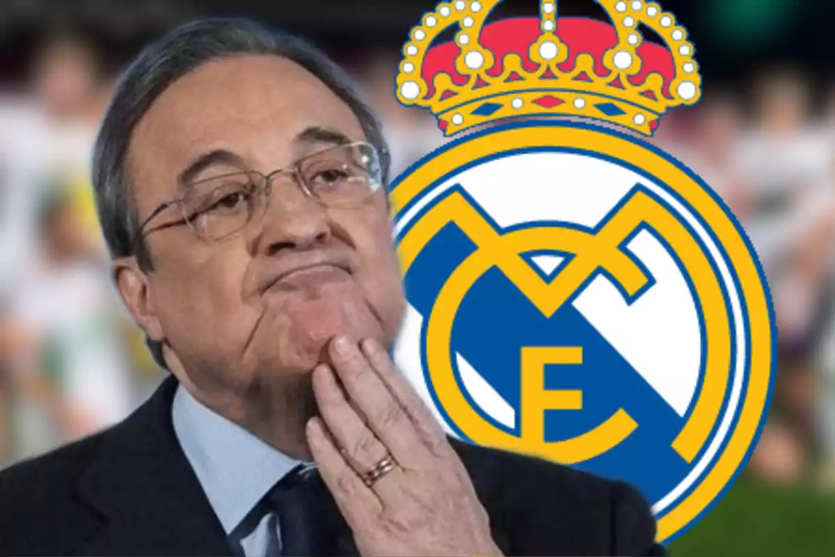 A man with a thoughtful expression in front of the Real Madrid crest.