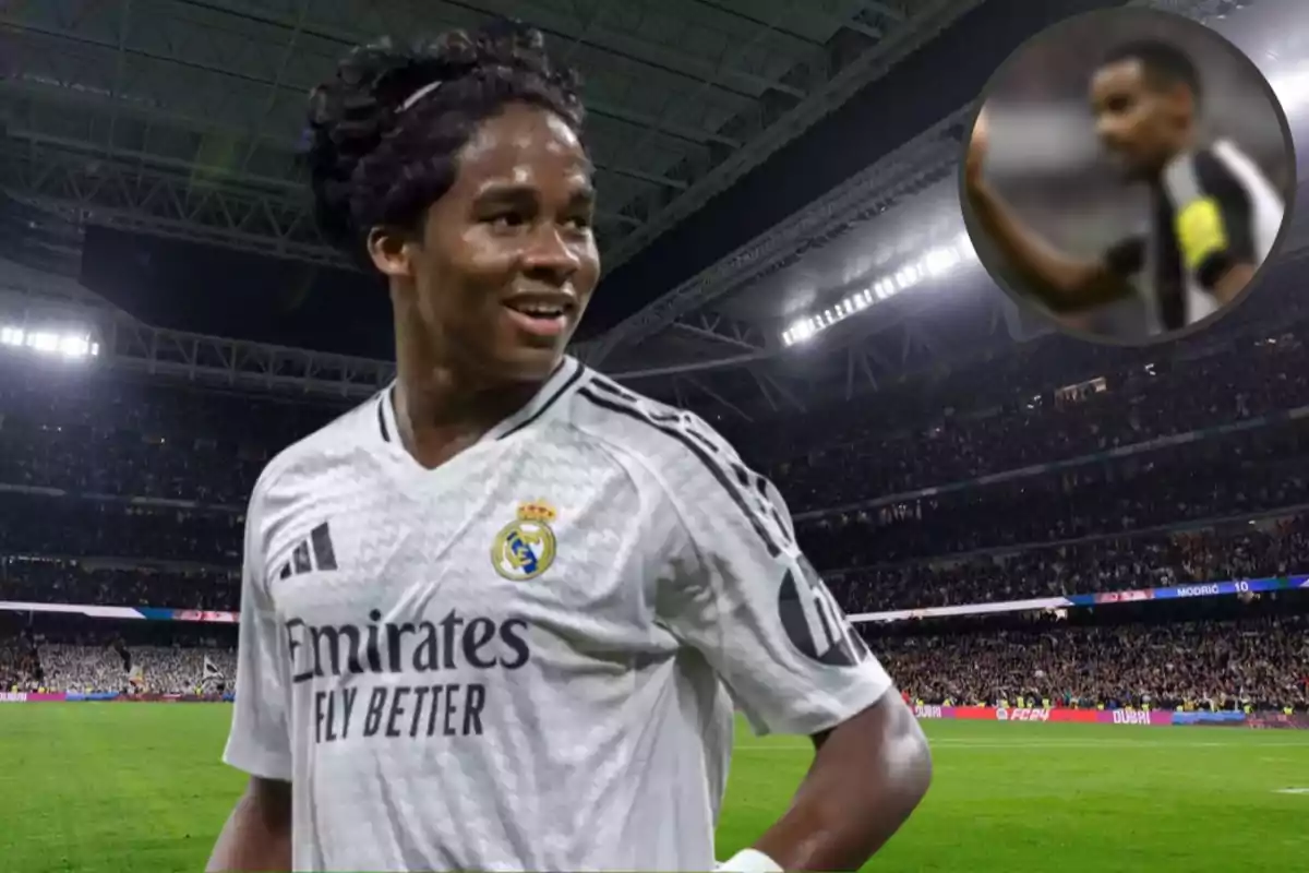 Football player in a white Real Madrid jersey in a floodlit stadium.