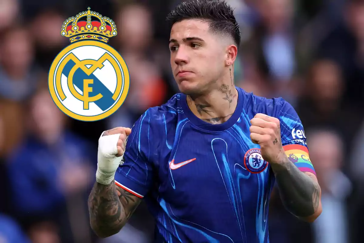 A player in a Chelsea uniform celebrates with the Real Madrid logo in the background.
