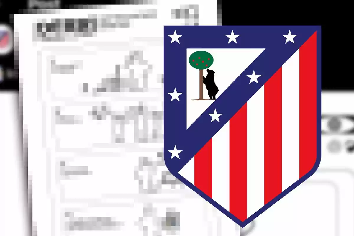 Atlético de Madrid crest on a blurry background.