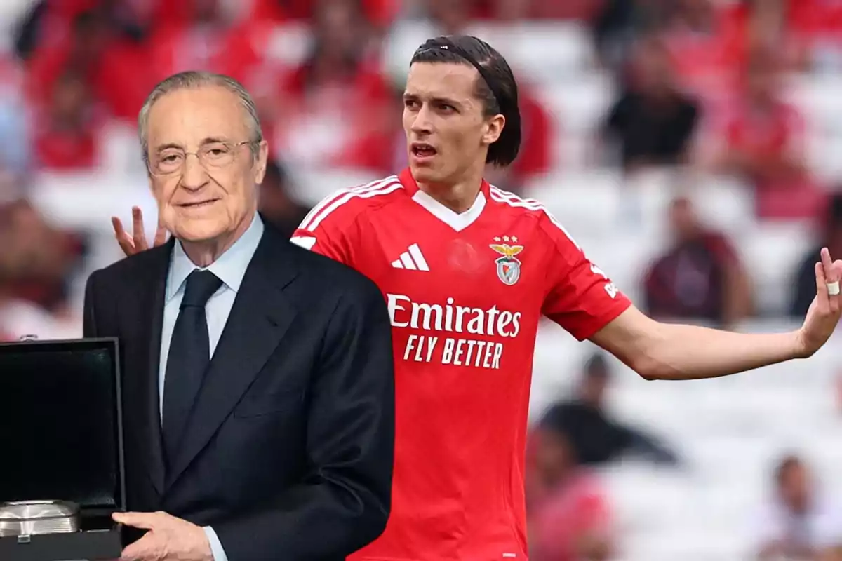 A man in a suit holds a box while in the background a player in a red Benfica uniform gestures in a stadium.