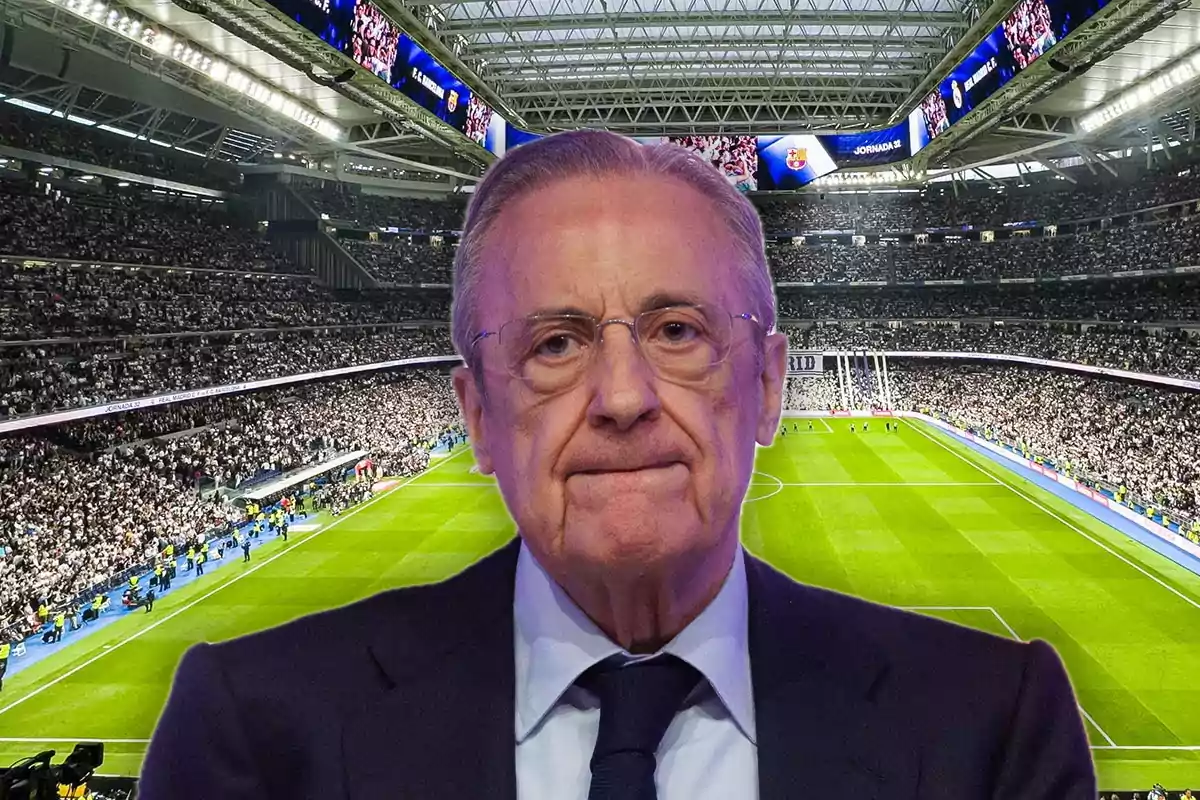 An older man with glasses and a suit is superimposed on the image of a football stadium full of spectators.