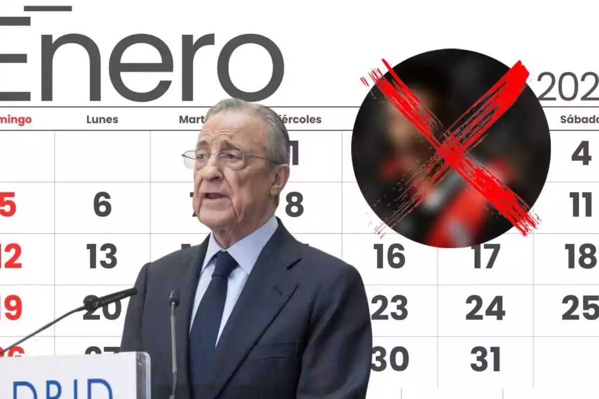 An older man with glasses and a suit speaks into a microphone with a January calendar in the background and a black circle with a large red X.