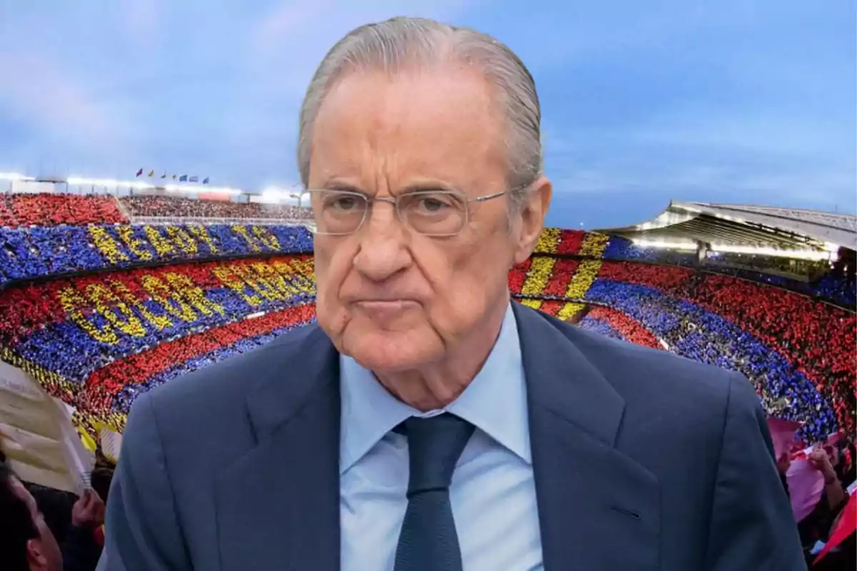 A man with a serious expression in front of a stadium full of fans with a colorful mosaic.