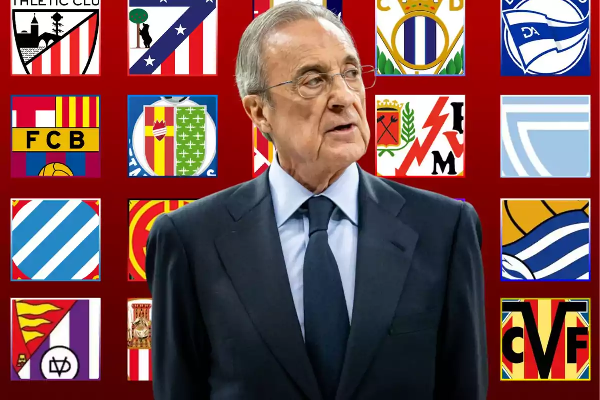 A man in a suit in front of a background with soccer team logos.