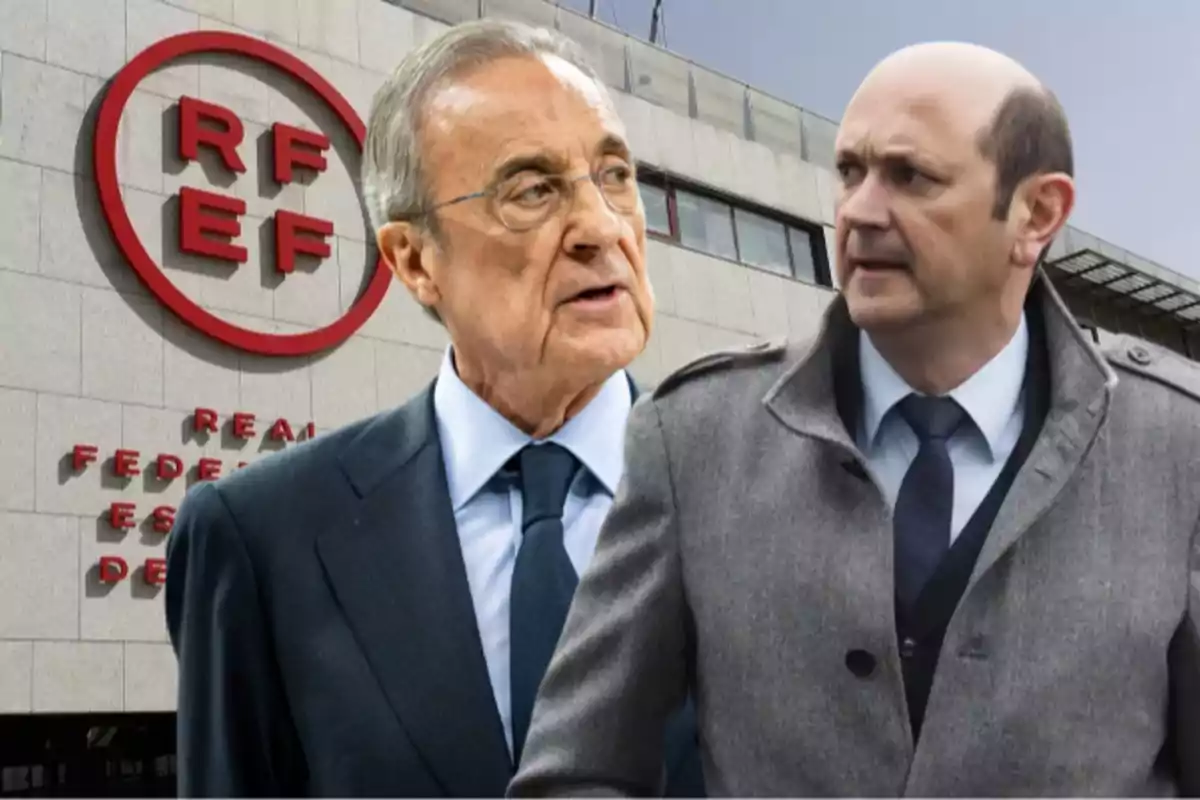 Two men in suits in front of the building of the Royal Spanish Football Federation.