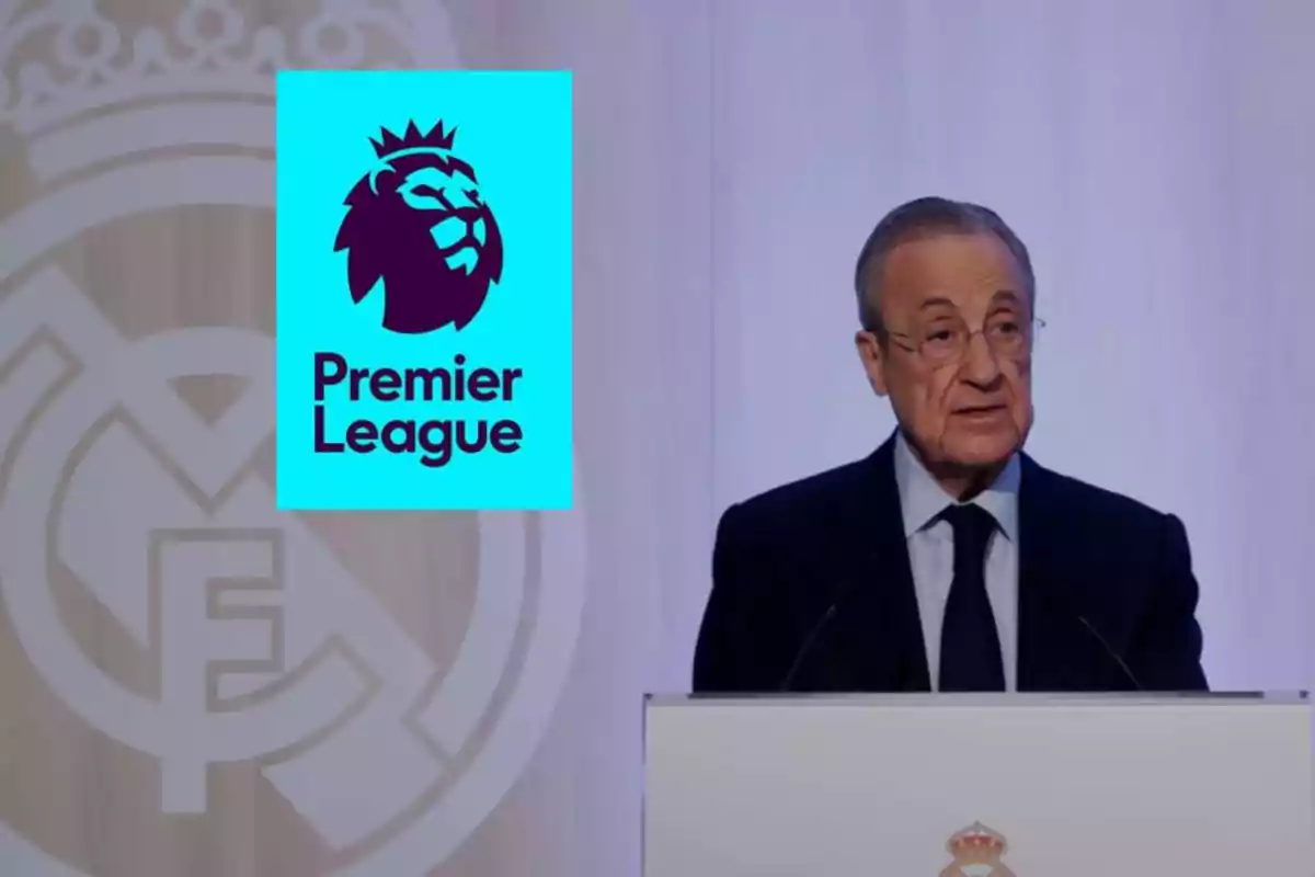 A man at a podium with the Premier League logo next to him.