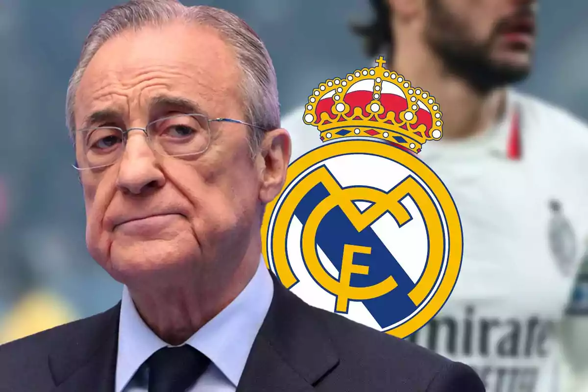 Un hombre mayor con gafas y traje frente al escudo del Real Madrid.