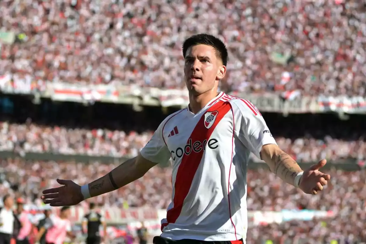 River Plate player celebrating a goal at the Monumental stadium with the stands full of fans River Plate player celebrating a goal at the Monumental stadium with the stands full of fans