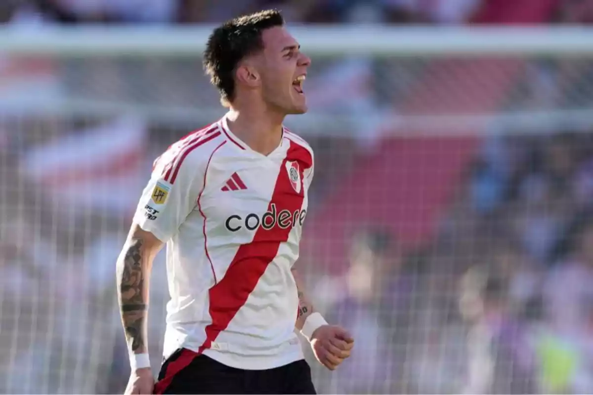 River Plate player celebrating a goal in the stadium with a joyful expression River Plate player celebrating a goal in the stadium with a joyful expression