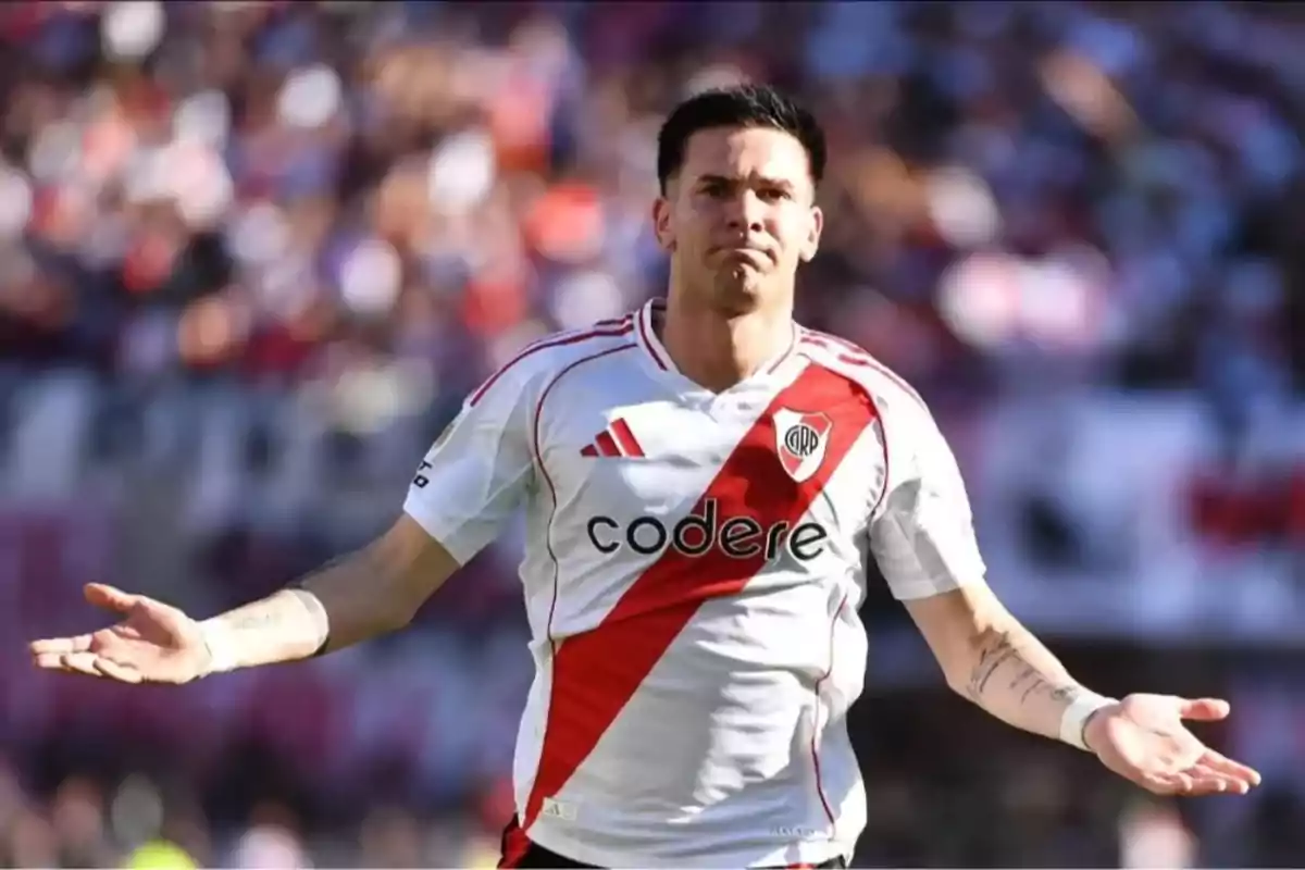 Soccer player in a River Plate uniform making a gesture of doubt or confusion on the field. Soccer player in a River Plate uniform making a gesture of doubt or confusion on the field.