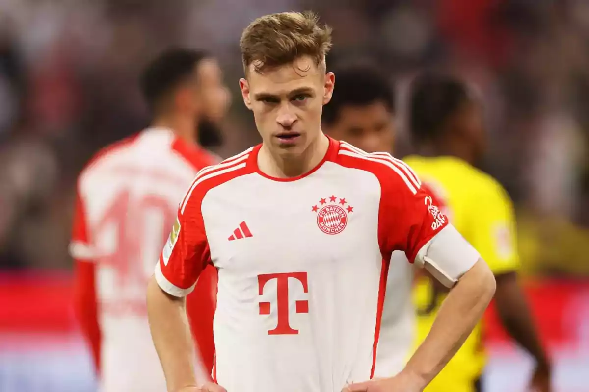 A player in a Bayern Munich uniform on the field.