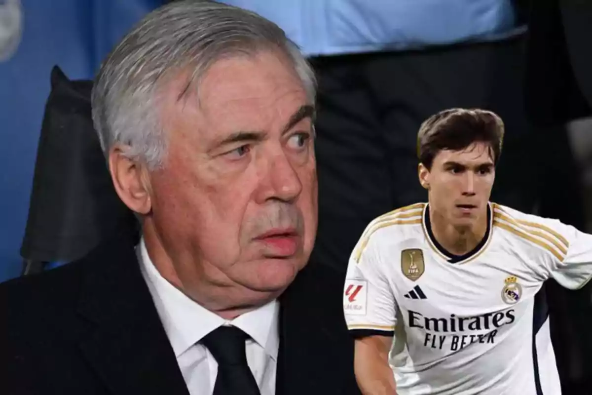 An older man in a dark suit watches as a soccer player in a white Real Madrid uniform runs on the field.