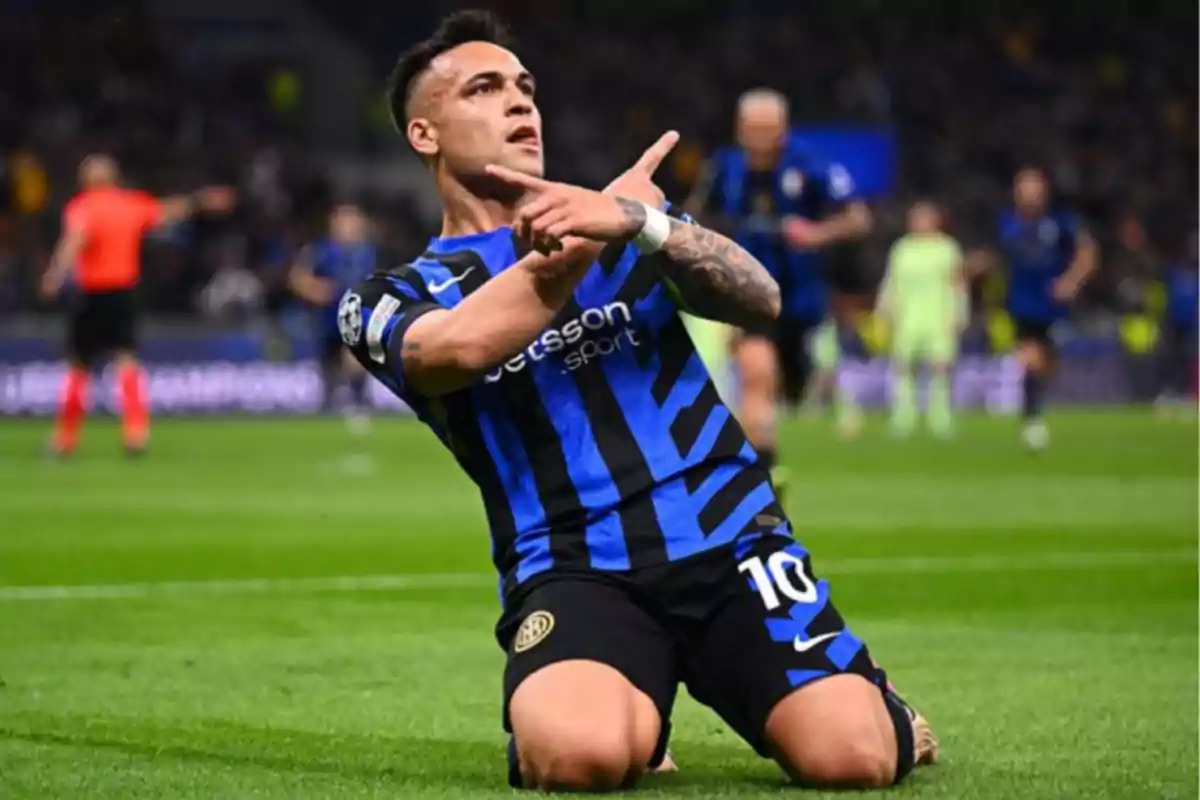 Soccer player celebrating a goal on the field in a blue and black uniform. Soccer player celebrating a goal on the field in a blue and black uniform.