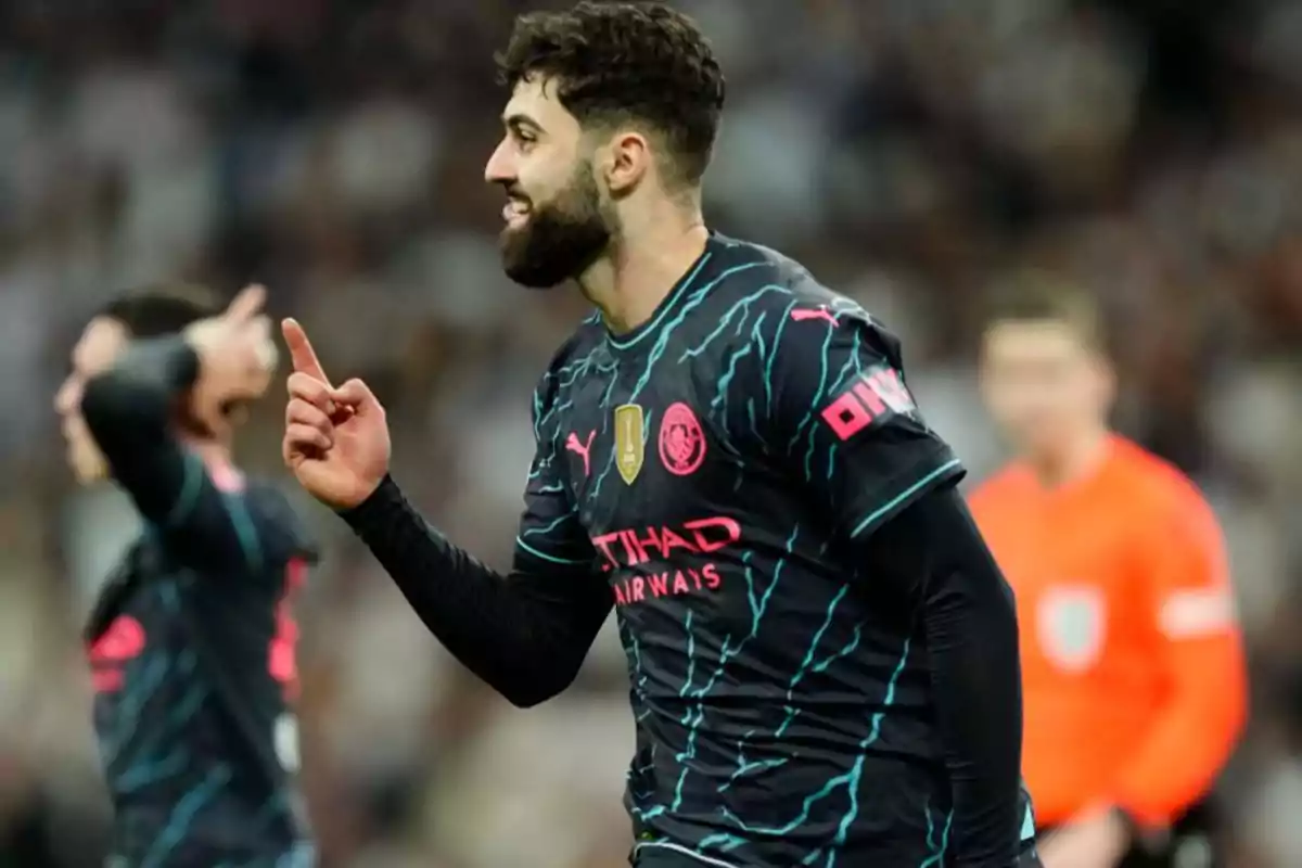 Soccer player celebrating a goal on the field. Soccer player celebrating a goal on the field.