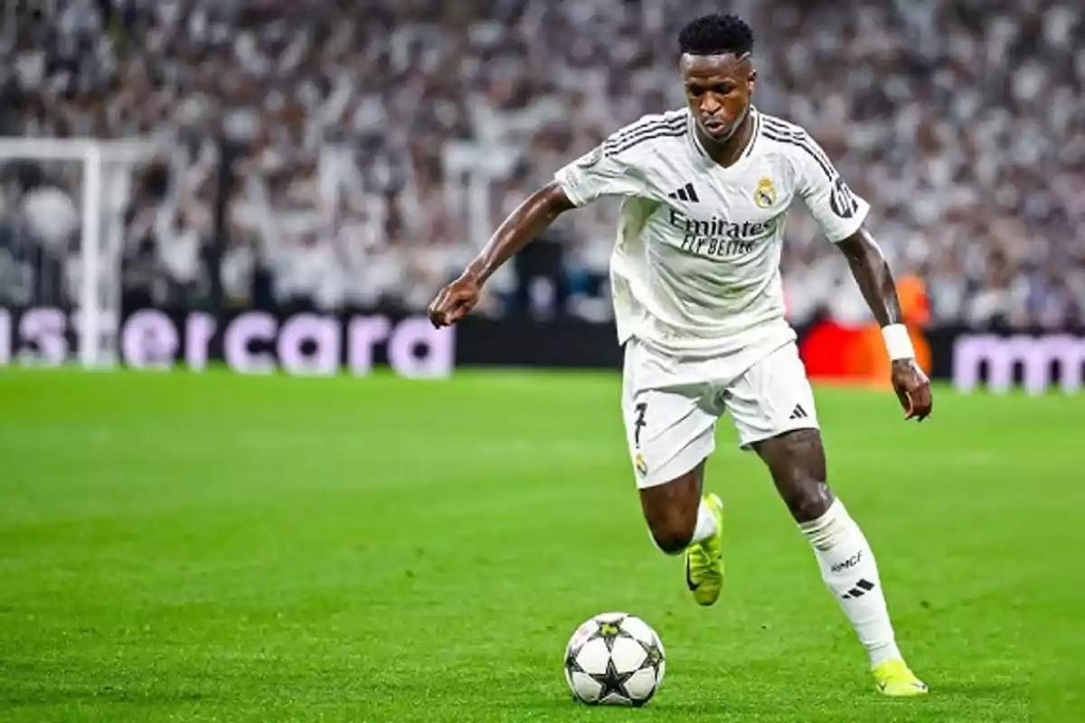 Soccer player in action during a match in white uniform. Soccer player in action during a match in white uniform.