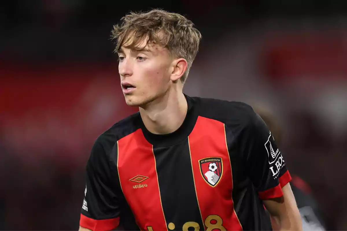 A player in the AFC Bournemouth uniform during a match. A player in the AFC Bournemouth uniform during a match.