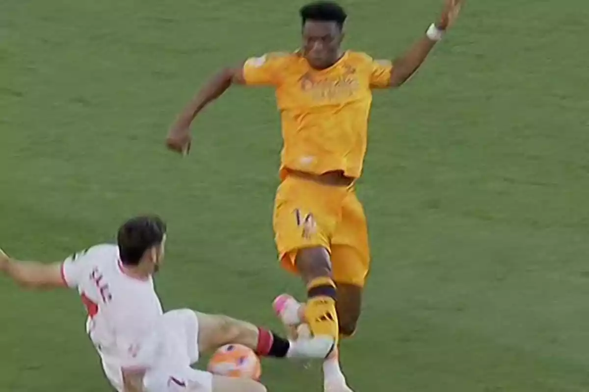Two players in action during a match, one of them trying to block the other. Two players in action during a match, one of them trying to block the other.