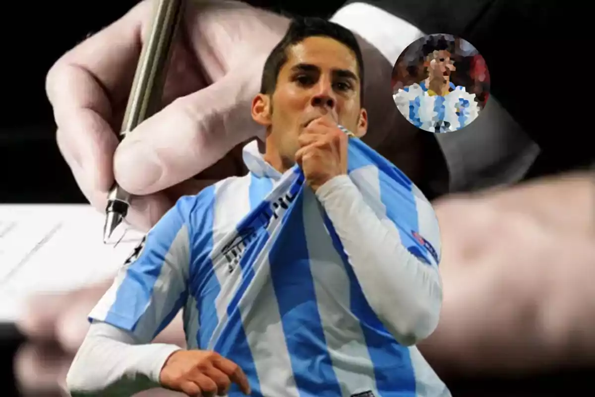 A soccer player kisses his jersey while in the background a hand is seen transfer a document.