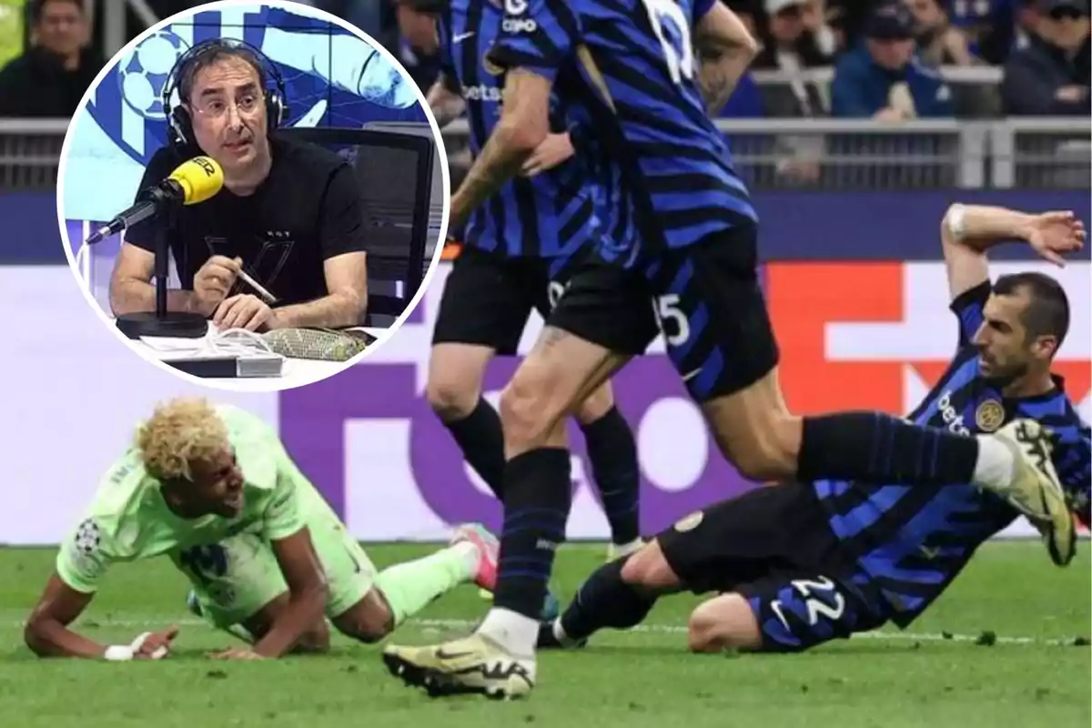 A sports commentator analyzes a soccer play in which a player from the team in blue and black uniform makes a sliding tackle while a player from the opposing team falls to the ground.
