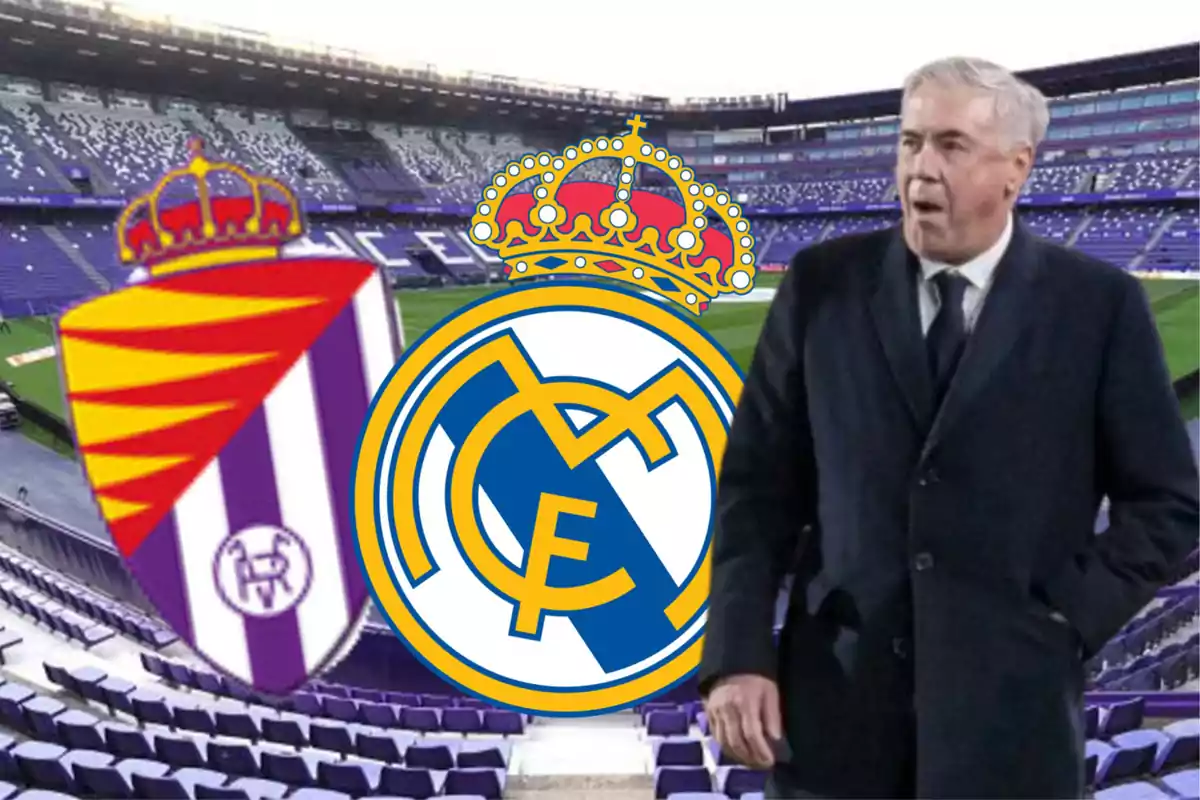 Un entrenador de fútbol en un estadio con los escudos del Real Valladolid y el Real Madrid.