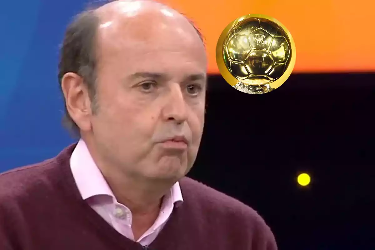 A man in a brown sweater and white jersey appears in a television studio with a blue and orange background, while a golden trophy floats in the upper right corner.
