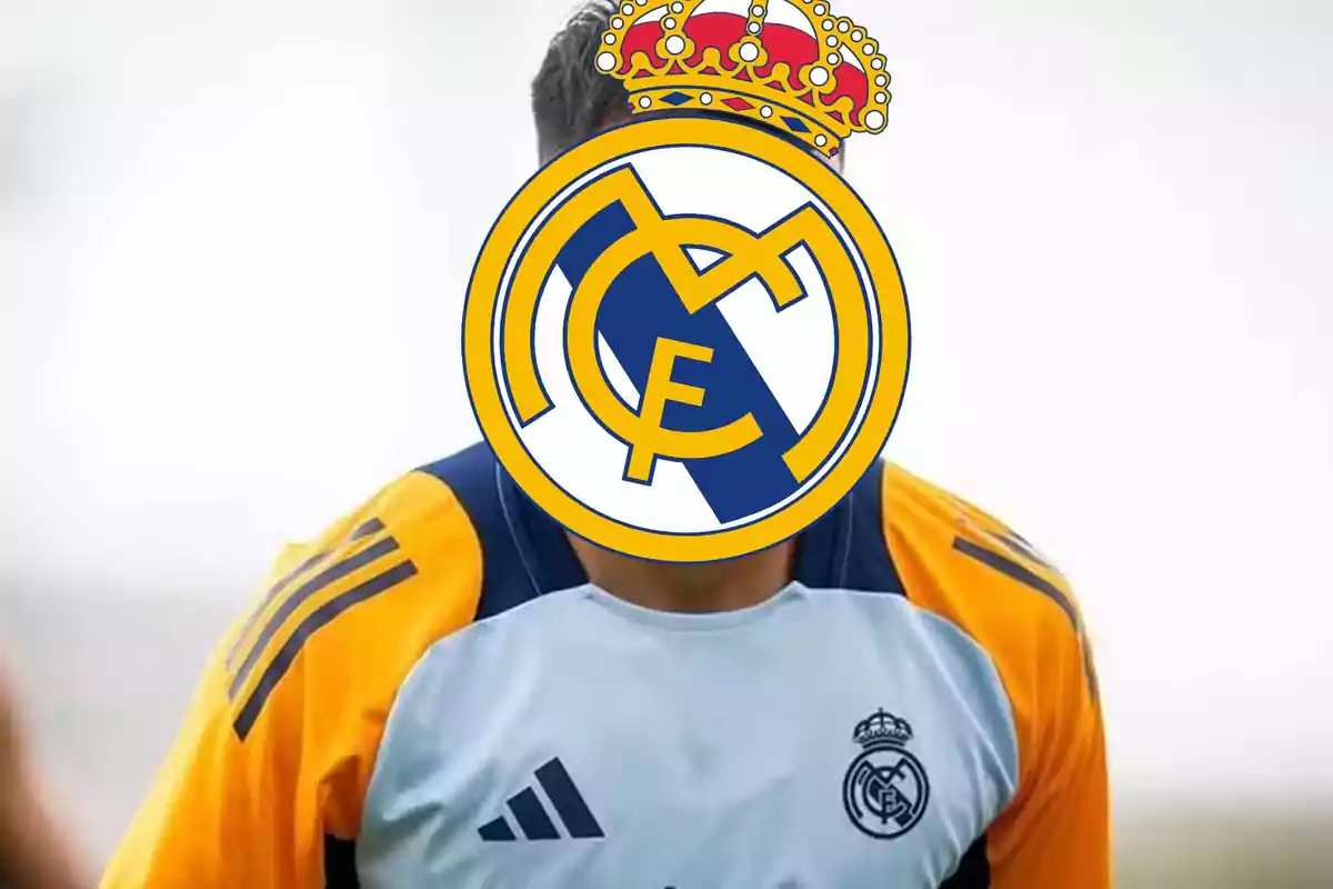 Person wearing a Real Madrid training uniform with the club’s crest covering their face