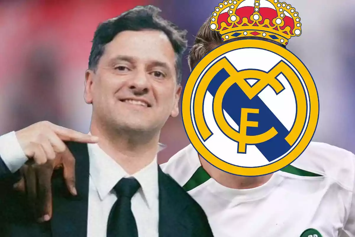 A smiling man in a dark suit points to another person whose face is covered by the Real Madrid crest.