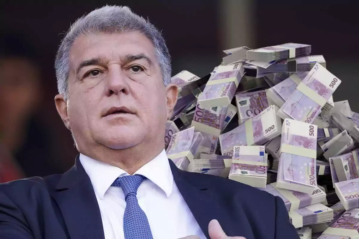 A man in a suit and tie is in front of a large amount of 500-euro bills.