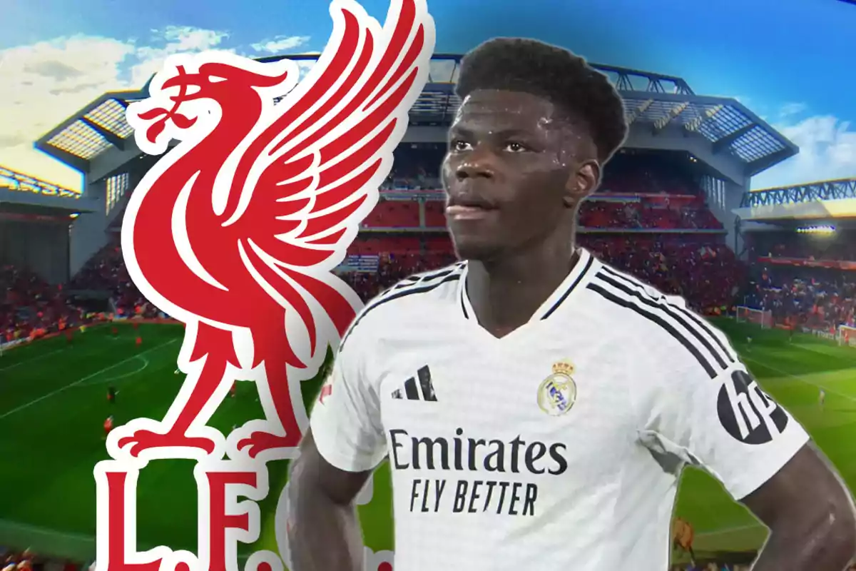 Football player wearing a Real Madrid jersey in front of the Liverpool logo in a stadium.