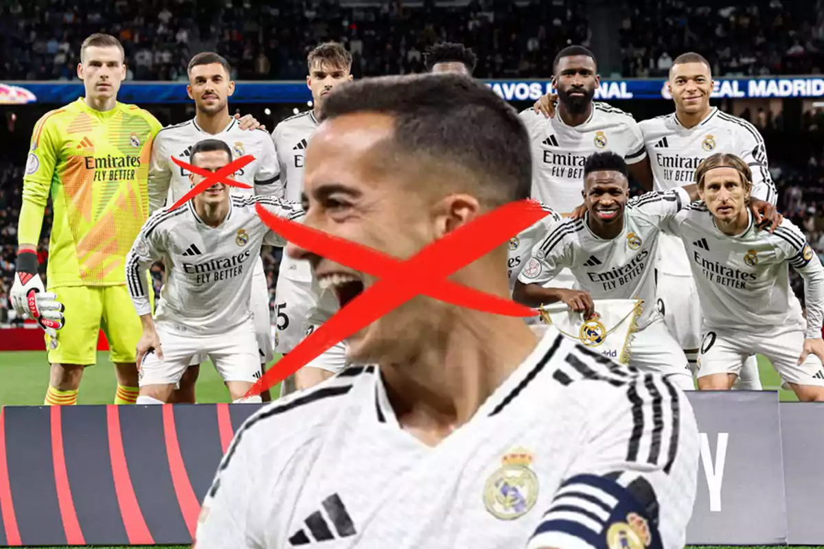 A group of Real Madrid soccer players posing on the field with one player in the foreground crossed out with a large red X.