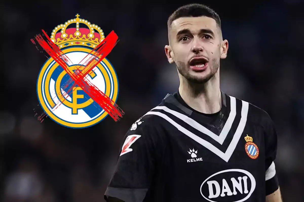 Espanyol player with the Real Madrid crest crossed out in red in the background