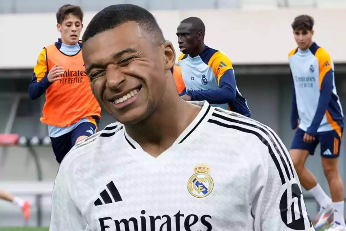 Real Madrid players training on the field.