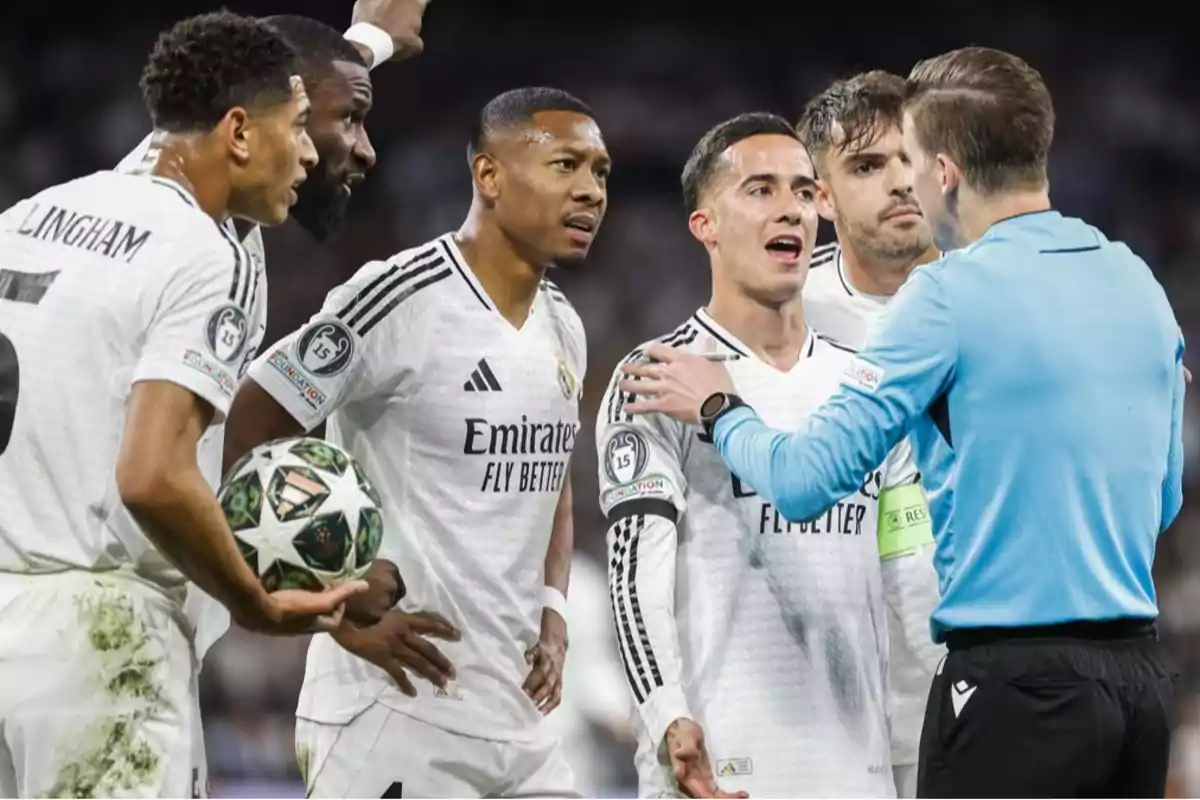 Real Madrid players argue with a referee during a match, one of them holding a UEFA Champions League ball. Real Madrid players argue with a referee during a match, one of them holding a UEFA Champions League ball.