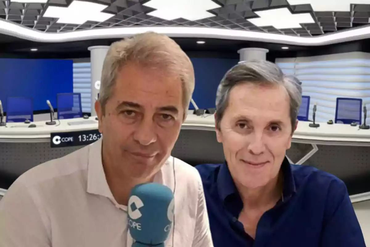 Two men pose in a modern radio studio with microphones and blue chairs in the background.