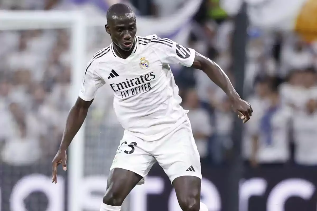 Real Madrid soccer player in action during a match. Real Madrid soccer player in action during a match.