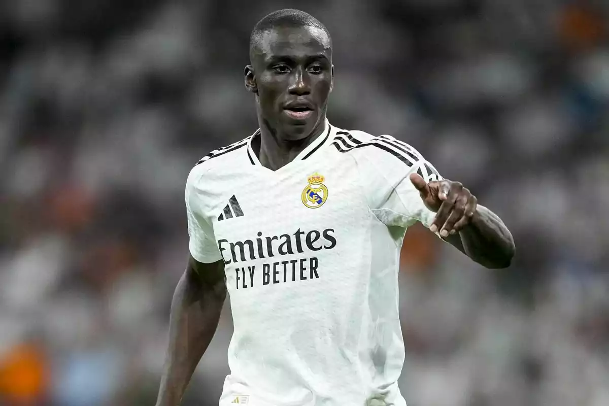 Real Madrid soccer player in action during a match. Real Madrid soccer player in action during a match.