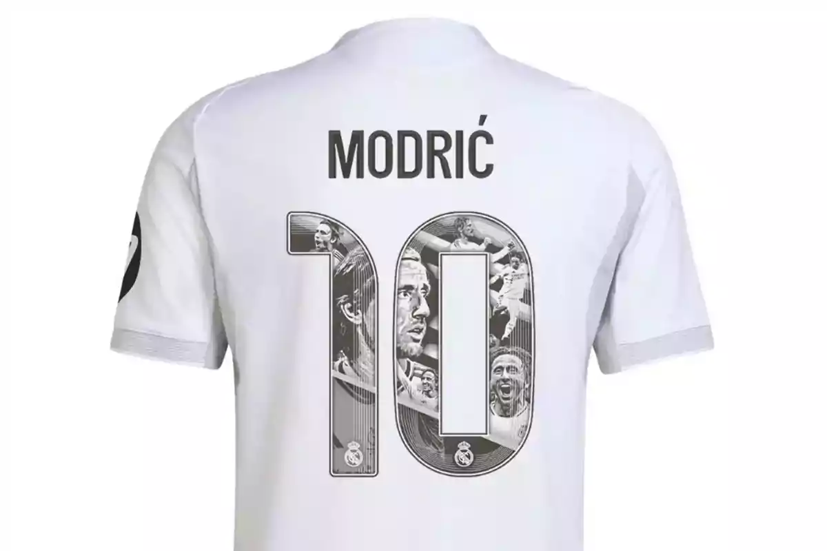 White soccer jersey with the name Modric and the number 10 decorated with black and white images of a player celebrating and in action White soccer jersey with the name Modric and the number 10 decorated with black and white images of a player celebrating and in action