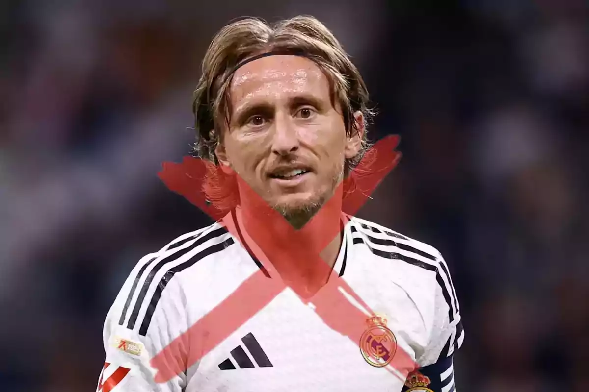A player in a black and white jersey has a big red X over their image.