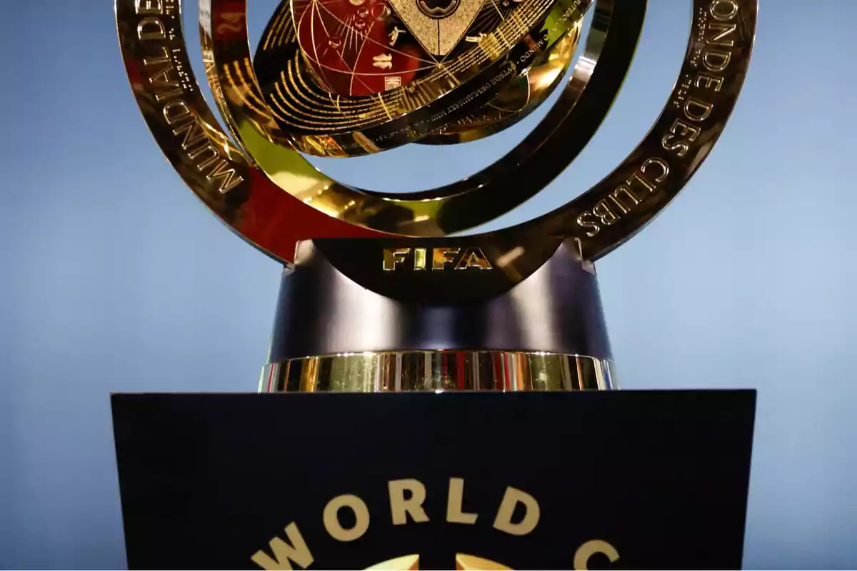 FIFA Club World Cup trophy on a black pedestal with golden letters FIFA Club World Cup trophy on a black pedestal with golden letters