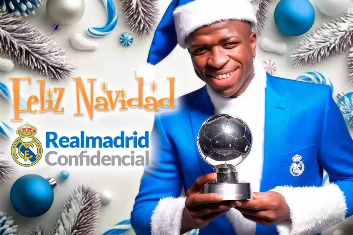 Hombre sonriente con traje azul y gorro navideño sosteniendo un trofeo de fútbol, rodeado de decoraciones navideñas y el texto "Feliz Navidad" junto al logo del Real Madrid.